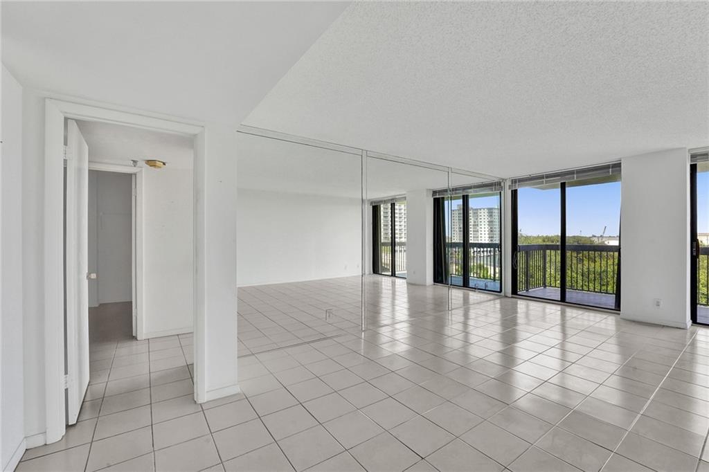  The primary bedroom is to the left of the living room.