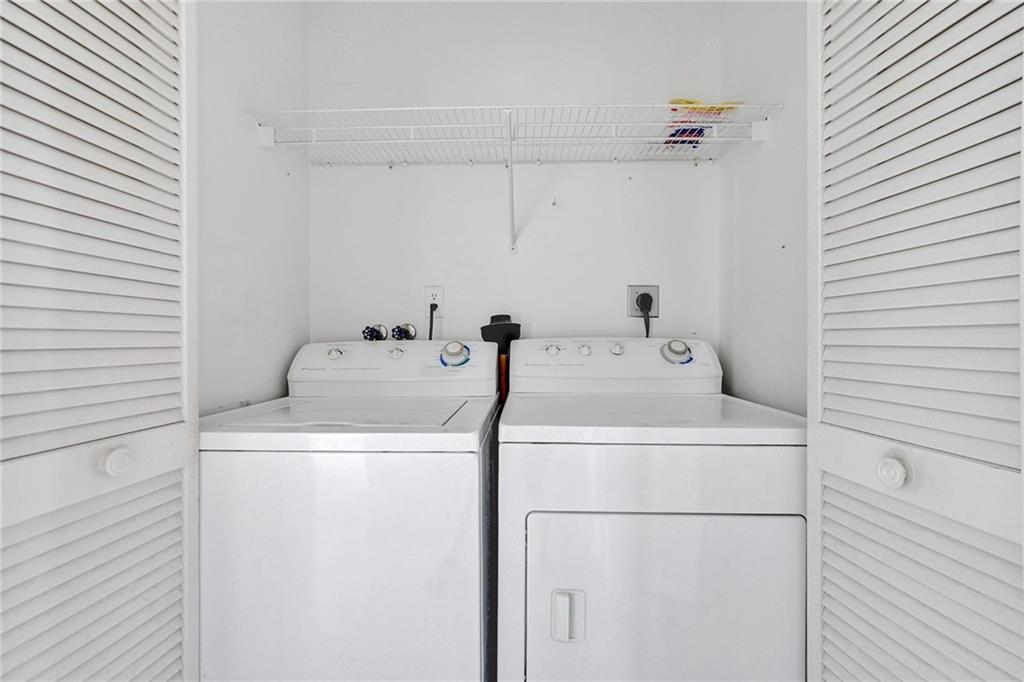  There is room for a full size washer and dryer.