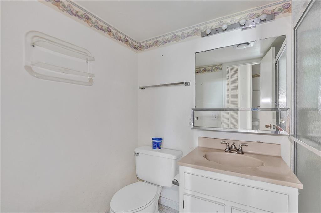  The second bathroom has a shower stall.