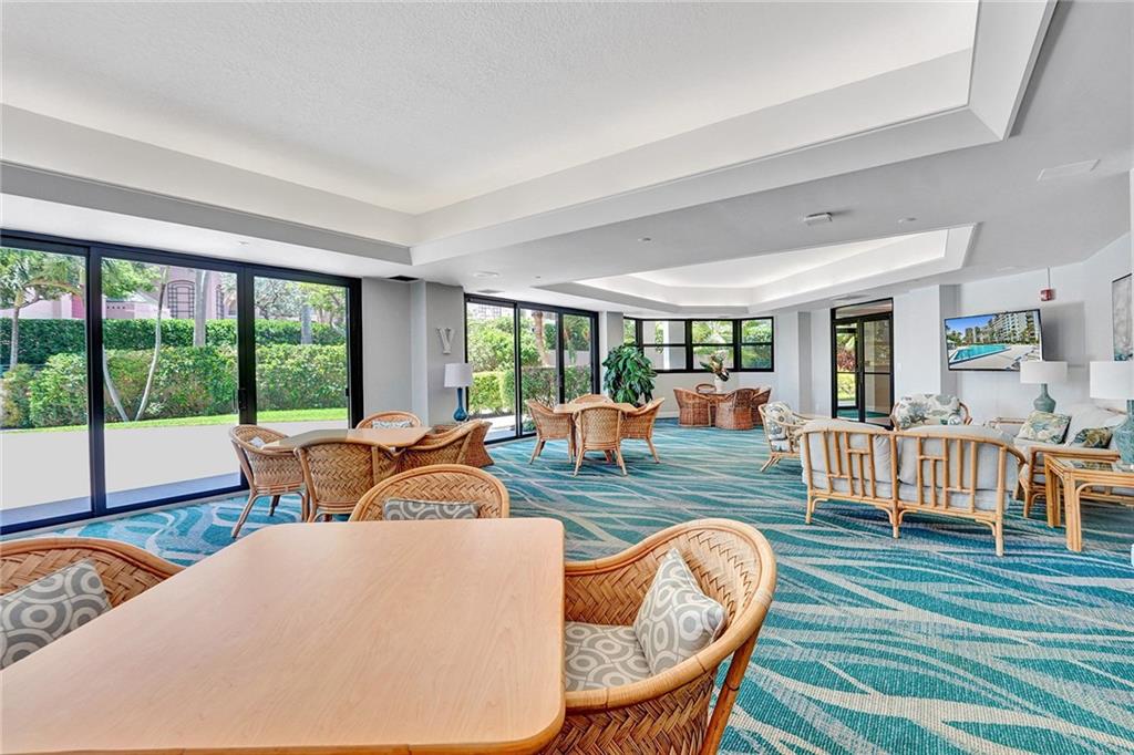 The community room overlooks the pool and the beautiful grounds.