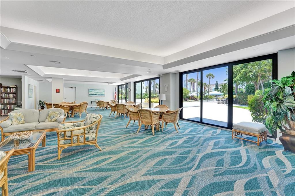  The community room has a pool table, a ping pong table, and a library area.