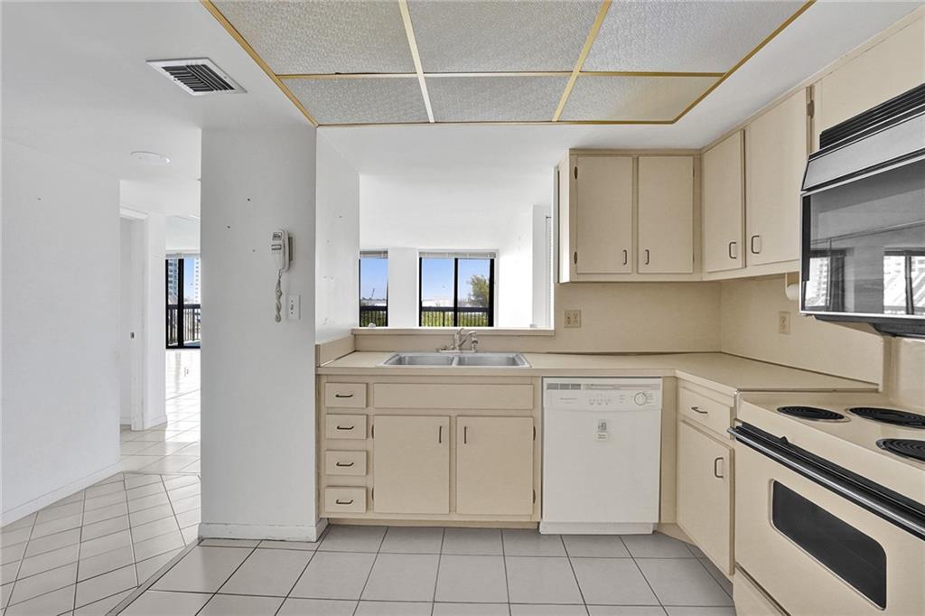  The kitchen is to the right as soon as you enter the apartment.