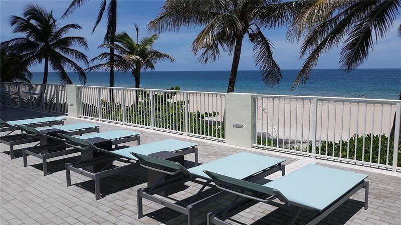 The lower beach deck has plenty of seating.