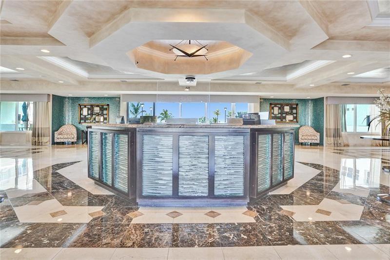 Southpoint has 24/7 security. The two luxury high rise towers are connected by this lovely lobby. A view out to the beautiful pool deck is visible. Southpoint is currently the only building on the Galt Mile that currently uses facial recognition for owners security.