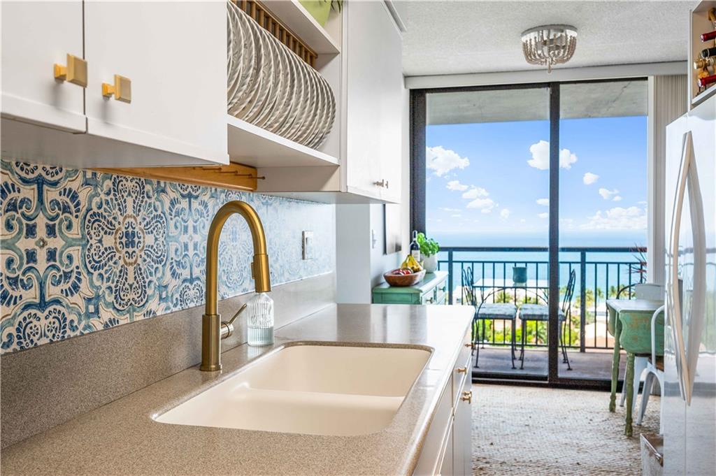Direct ocean views from your kitchen.  **Beaded flush mount fixture does not convey.**