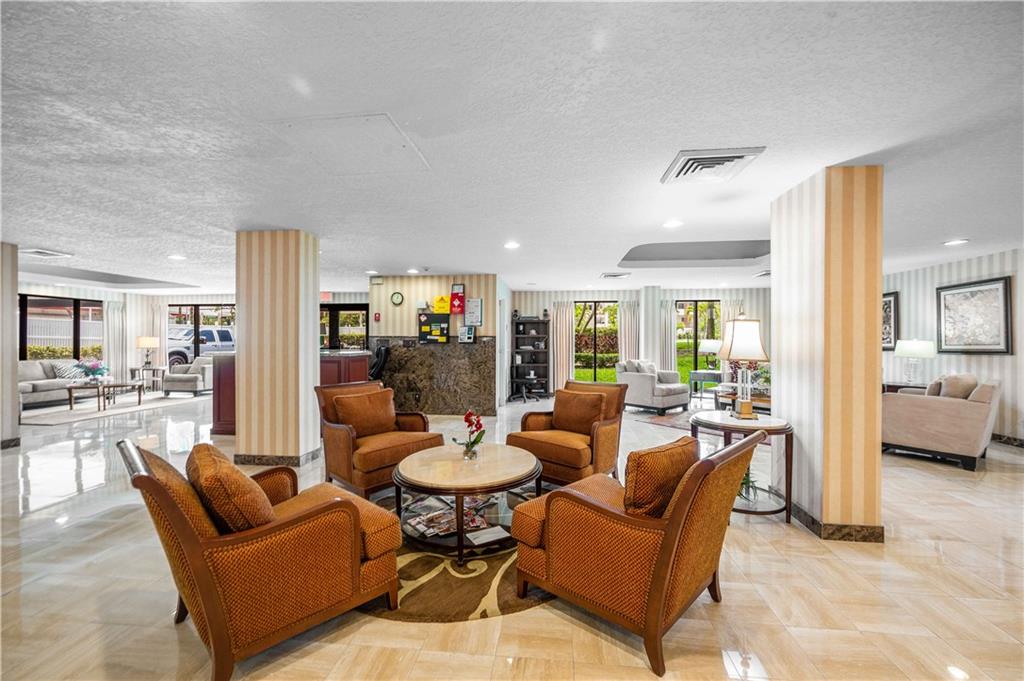 Multiple sitting areas in the lobby.