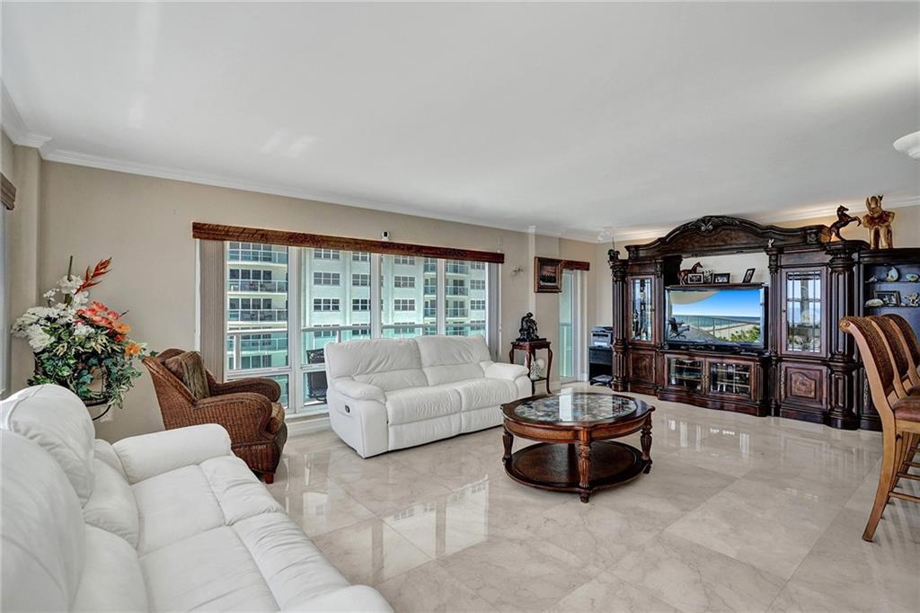 The door to the left of the wall unit leads out to the balcony.