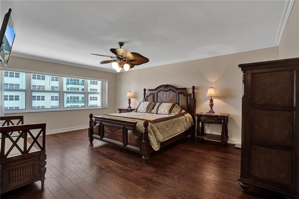 Southpoint is known for its roomy primary bedrooms. From the bed, you can easily see the ocean.