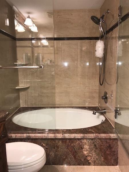 Primary bathroom has a large soaking tub.