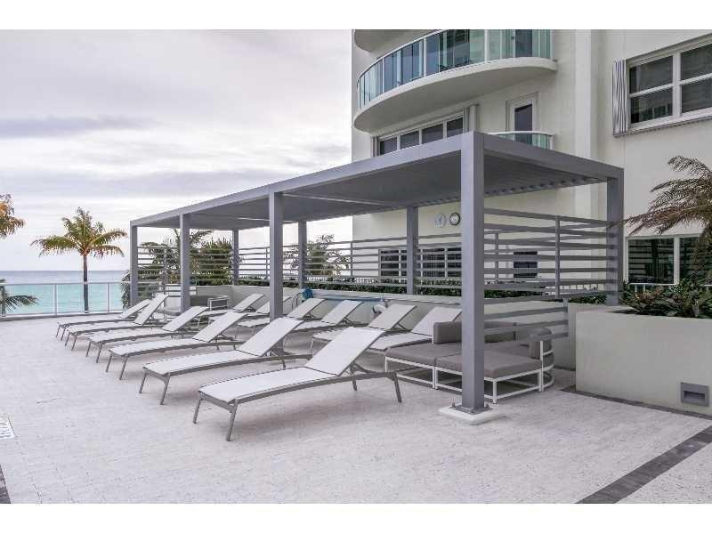  The upper pool deck has two trellis areas for shade.