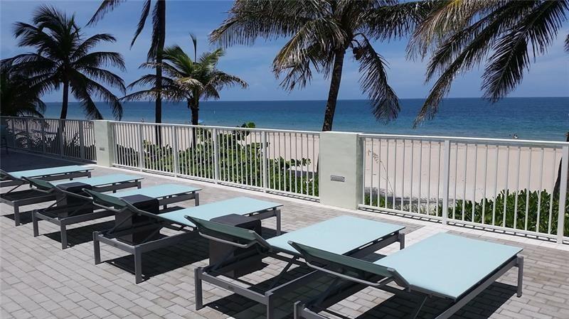 The lower beach deck, facing north. The bbq's, the bocce court and the stairs leading up to the tennis court are here.