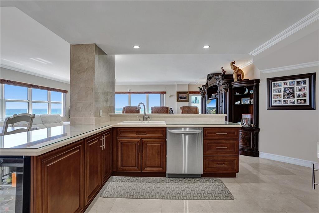The kitchen has marble countertops.