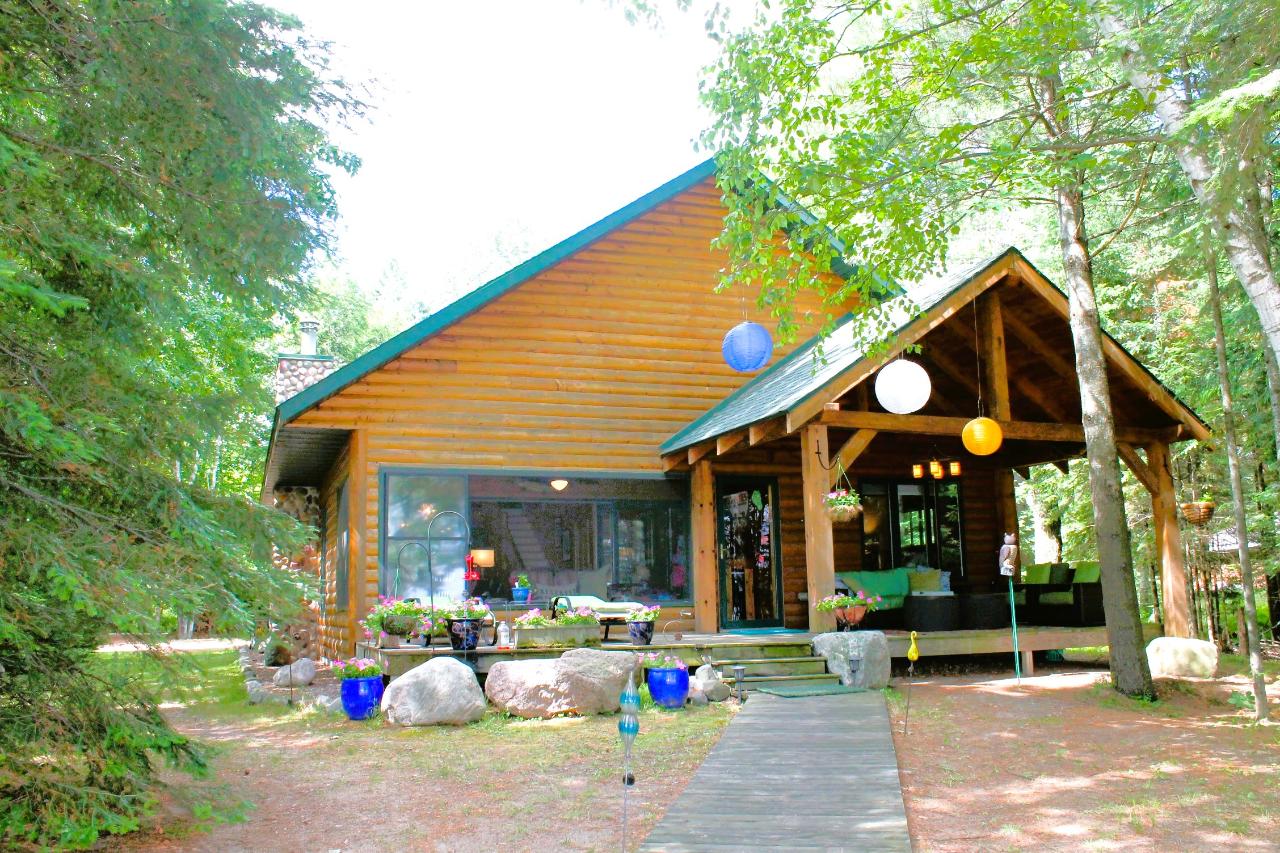 Two Sisters Lake Property 6484 Pinehurst Dr Photo 1