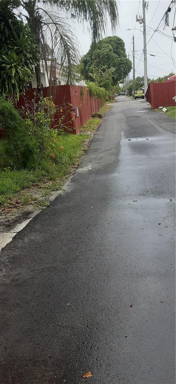 THE ALLEYWAY LEADS NO & SOUTH