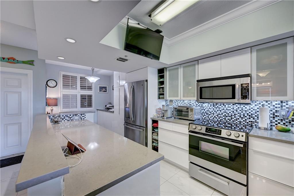 Contemporary Updated Kitchen with Stainless Steel Appliances