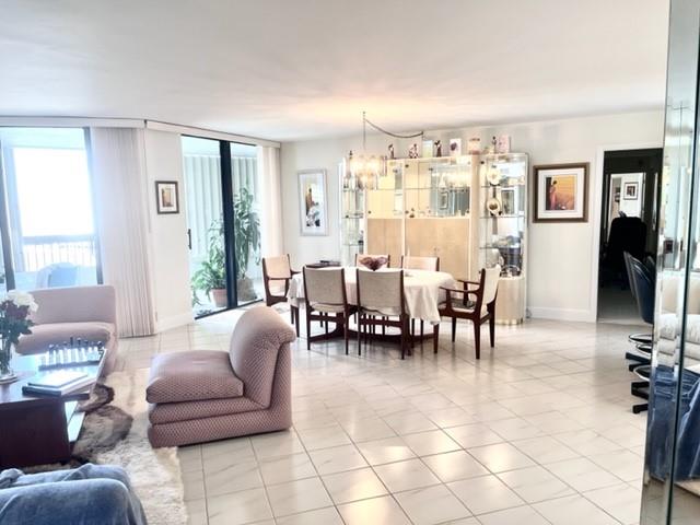 Open floor plan with slider to the covered balcony