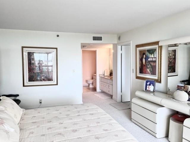 Large master bedroom with dressing room with huge walk-in closet and a full bath