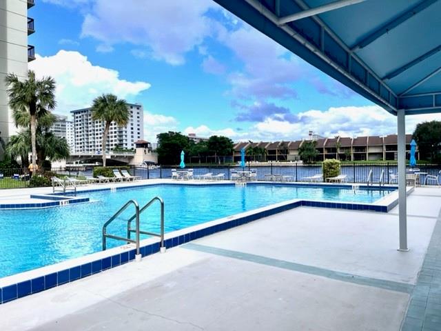 Oversize heated resort style pool at the Intracoastal water's edge where there's always a parade of boats. Enjoy the Florida lifestyle