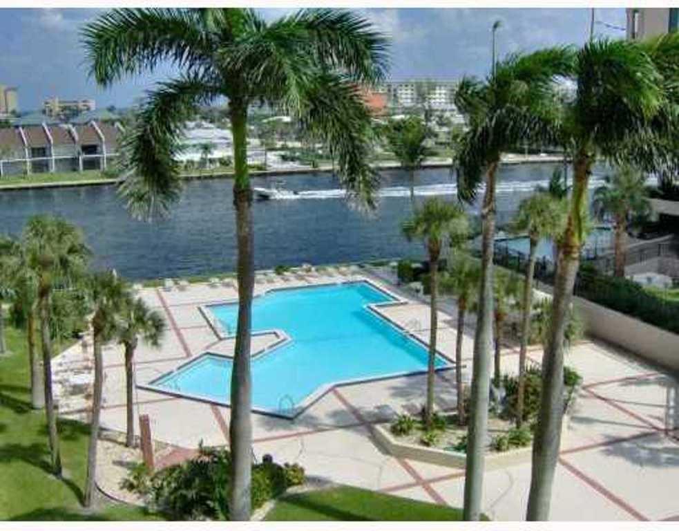 Oversized resort style heated pool at waters edge.