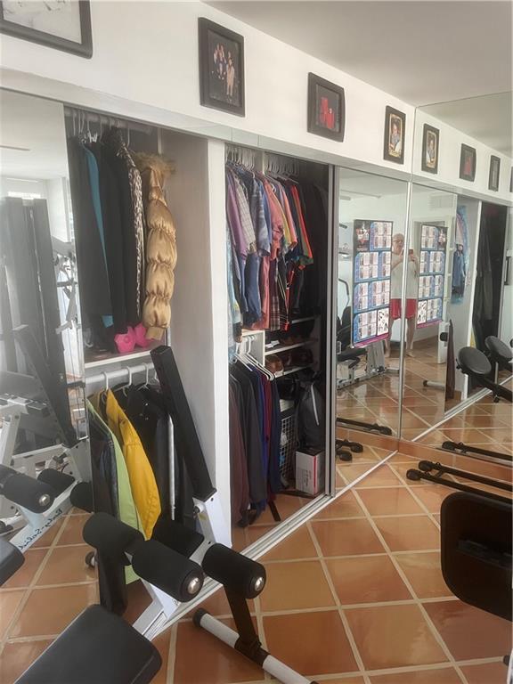 Bedroom #2 - Partial view of wall to wall built in closet