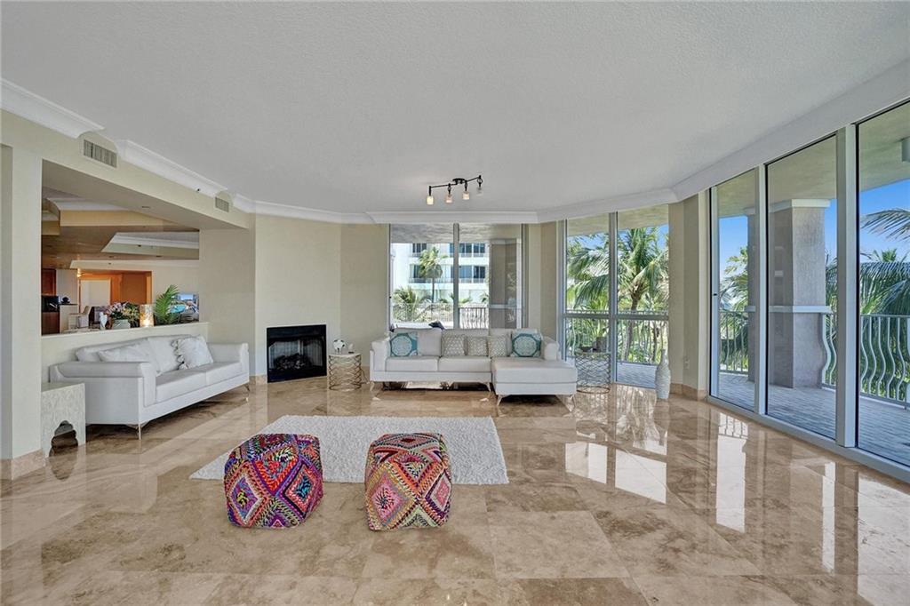 Additional living room with fireplace.