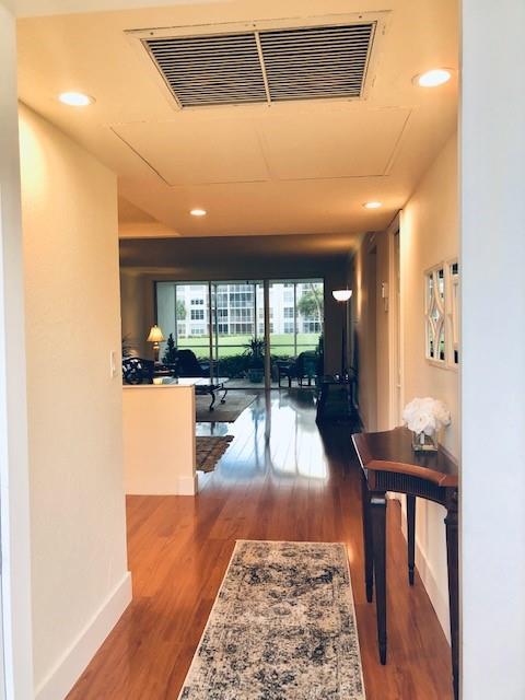 Foyer out to living, patio and expansive greenery/ICW