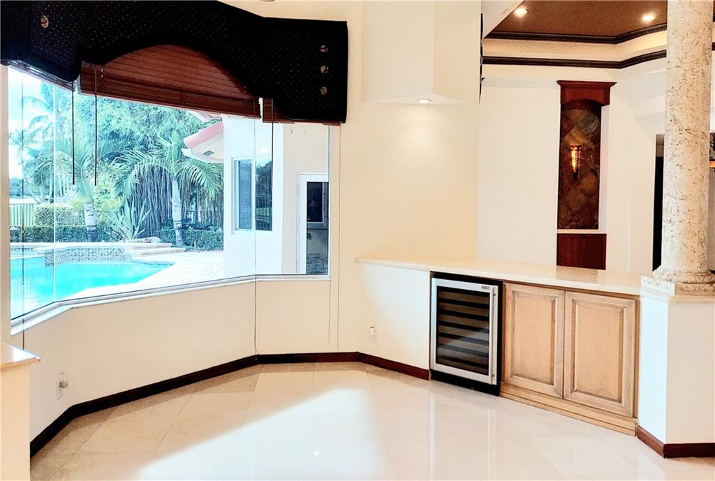 Casual dining area with wine cooler and views