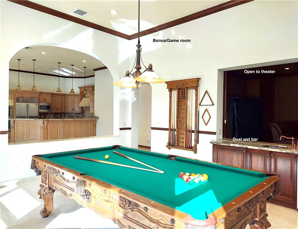 Game room has a wet bar that theater uses too.