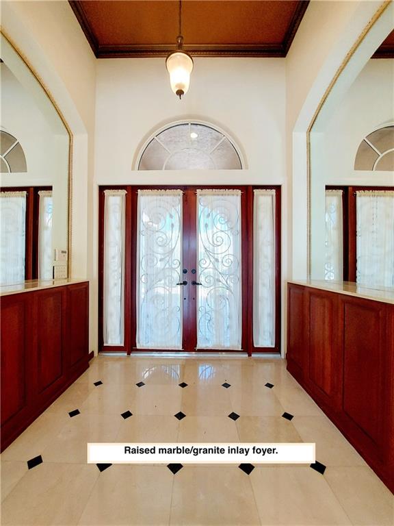 Marble foyer with granite inlays