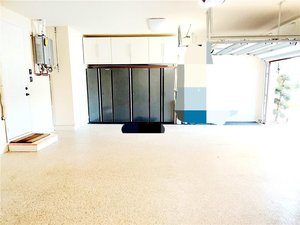 Three car garage new openers, doors are impact