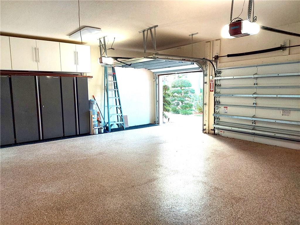 Garage floors are epoxy for easy to clean & durable.
