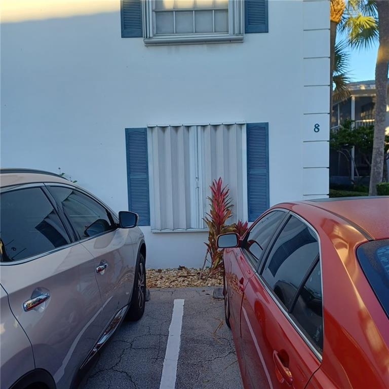 Parking space (red car)