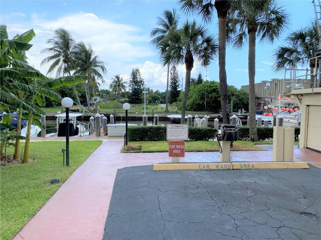 Residents can wash their car while enjoying the boats go by the canal