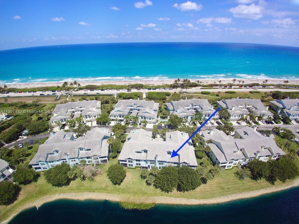 Stunning waterfront exterior at 905 Mainsail Circle - Condo in Jupiter