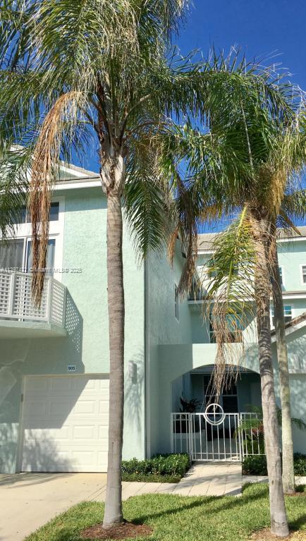 Spacious living room with panoramic views at 905 Mainsail Circle - Condo in Jupiter