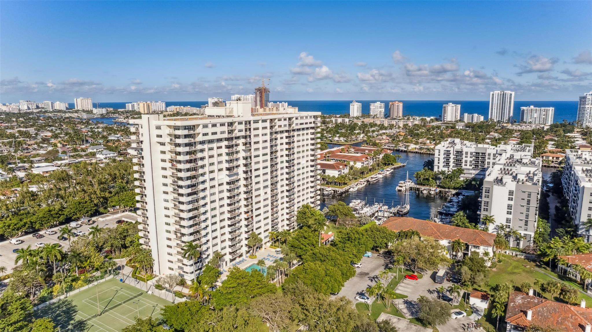 Showing corner of unit on 3rd floor w/SW exposure overlooking tennis courts to the W and below balcony looking S is the community pool. Great location!