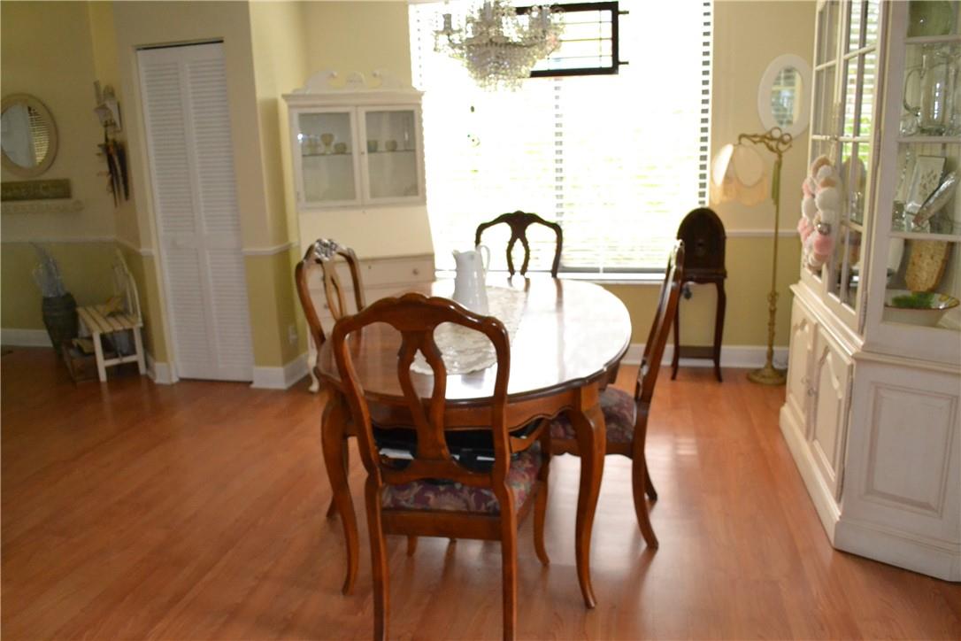 HAVING AN END UNIT ALLOWS YOUR HOME TO HAVE THIS EXTRA DINING ROOM WINDOW FOR NATURAL LIGHT.
