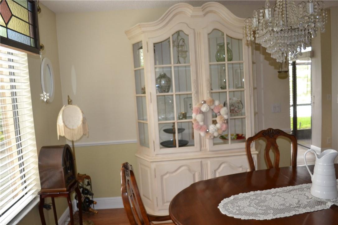 NICE WALL SPACE IN THE DINING AREA FOR YOUR BREAKFRONT OR CREDENZA.