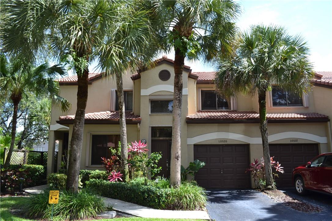 BEAUTIFUL AND WELL MAINTAINED LANDSCAPING.