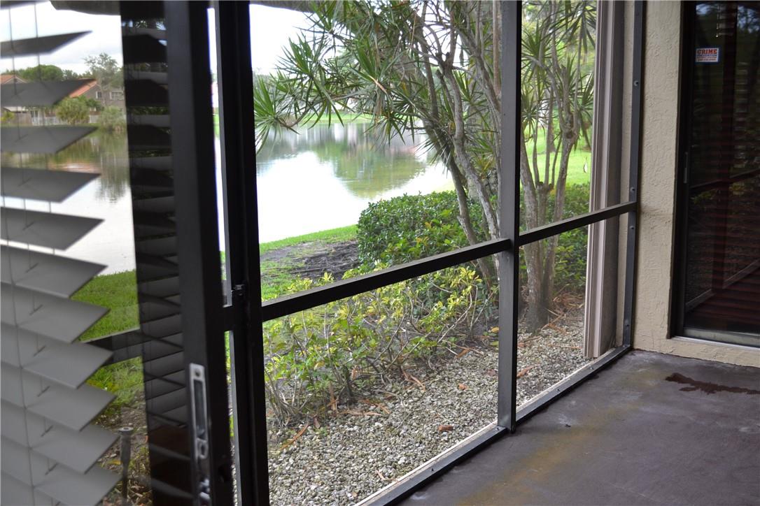 SCREENED PATIO WITH SERENE VIEW OF THE LAKE.  GREAT FOR COFFEE IN THE MORNING OR JUST SIT OUT AND RELAX AFTER WORK.