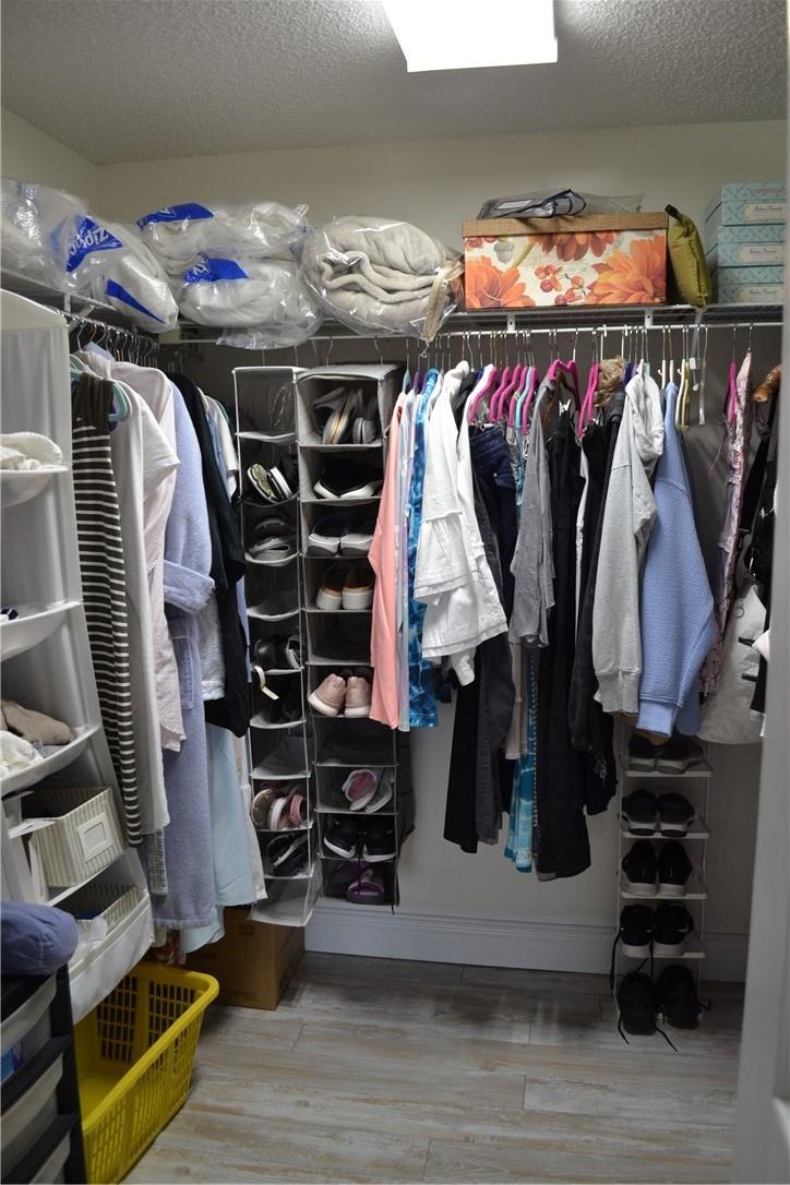 WALK IN MASTER BEDROOM CLOSET.