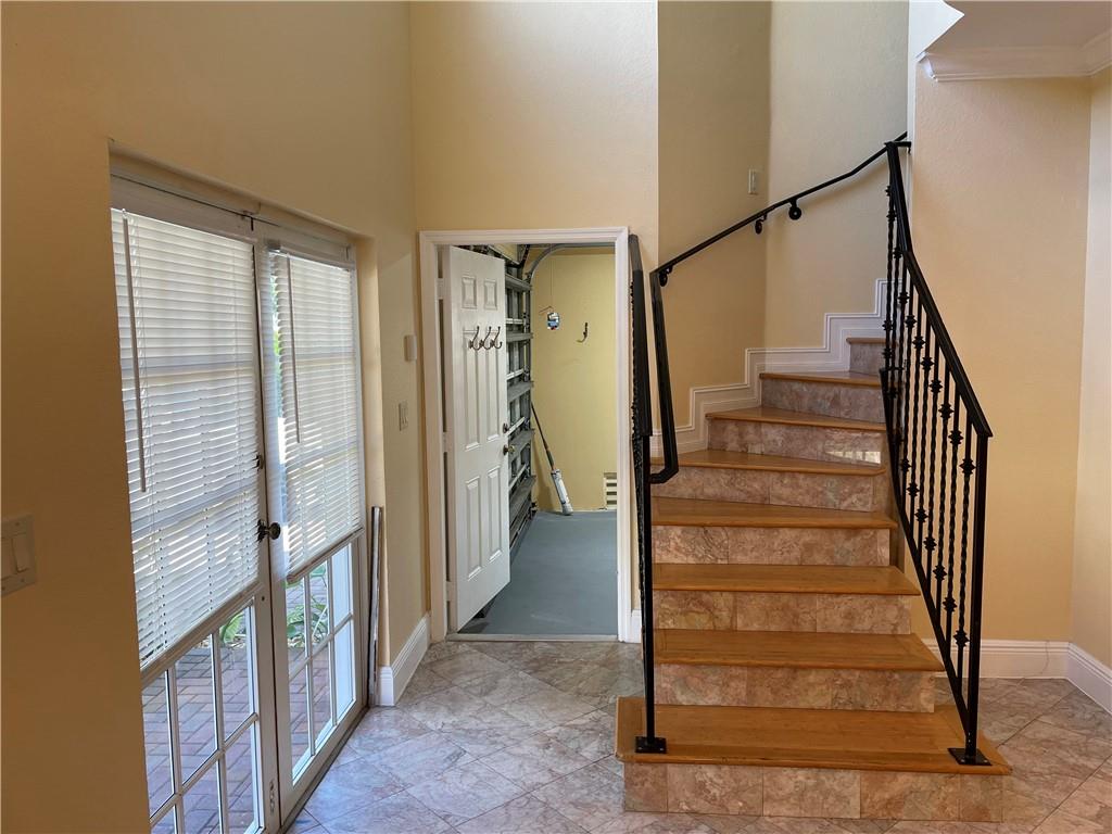 Entrance to garage or stairs to 2nd floor