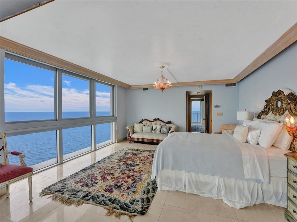 Direct ocean floor to ceiling windows in Master