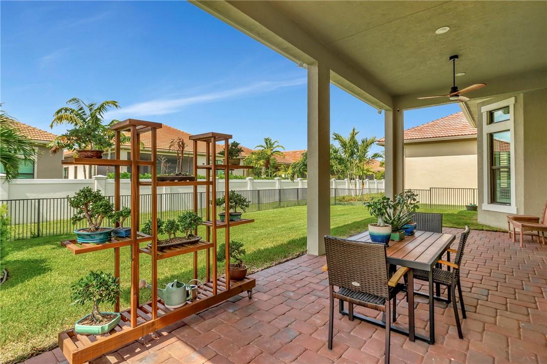 Spacious covered outdoor patio with LED lighting with built in audio speakers for Bluetooth music perfect for entertaining.