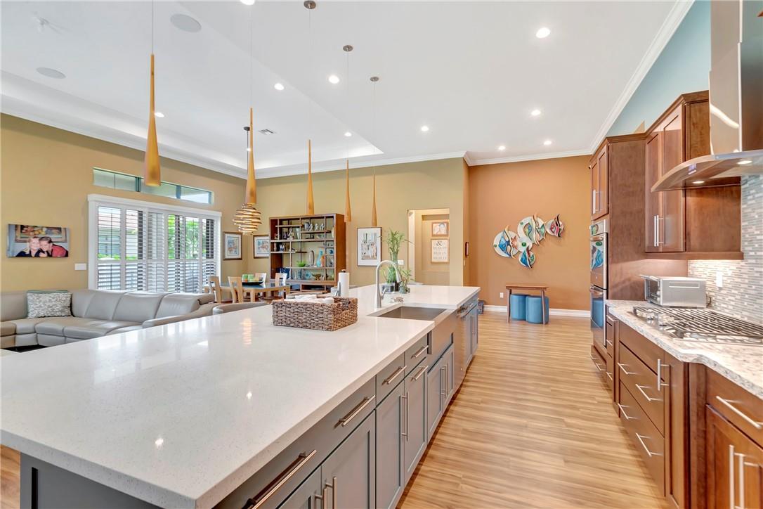 The Kitchen has an oversized quartz island built for a chef and perfect for entertaining.
