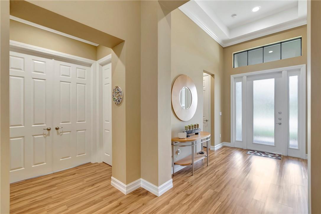Foyer and hallway to 2nd Bedroom and Office/Den.