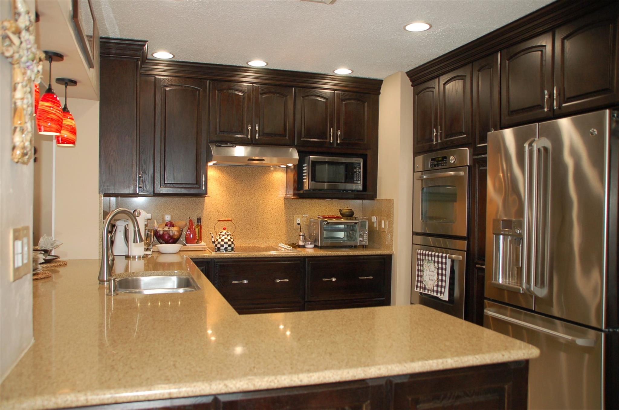 Remodeled Kitchen - Quartz Countertops - SS appliances