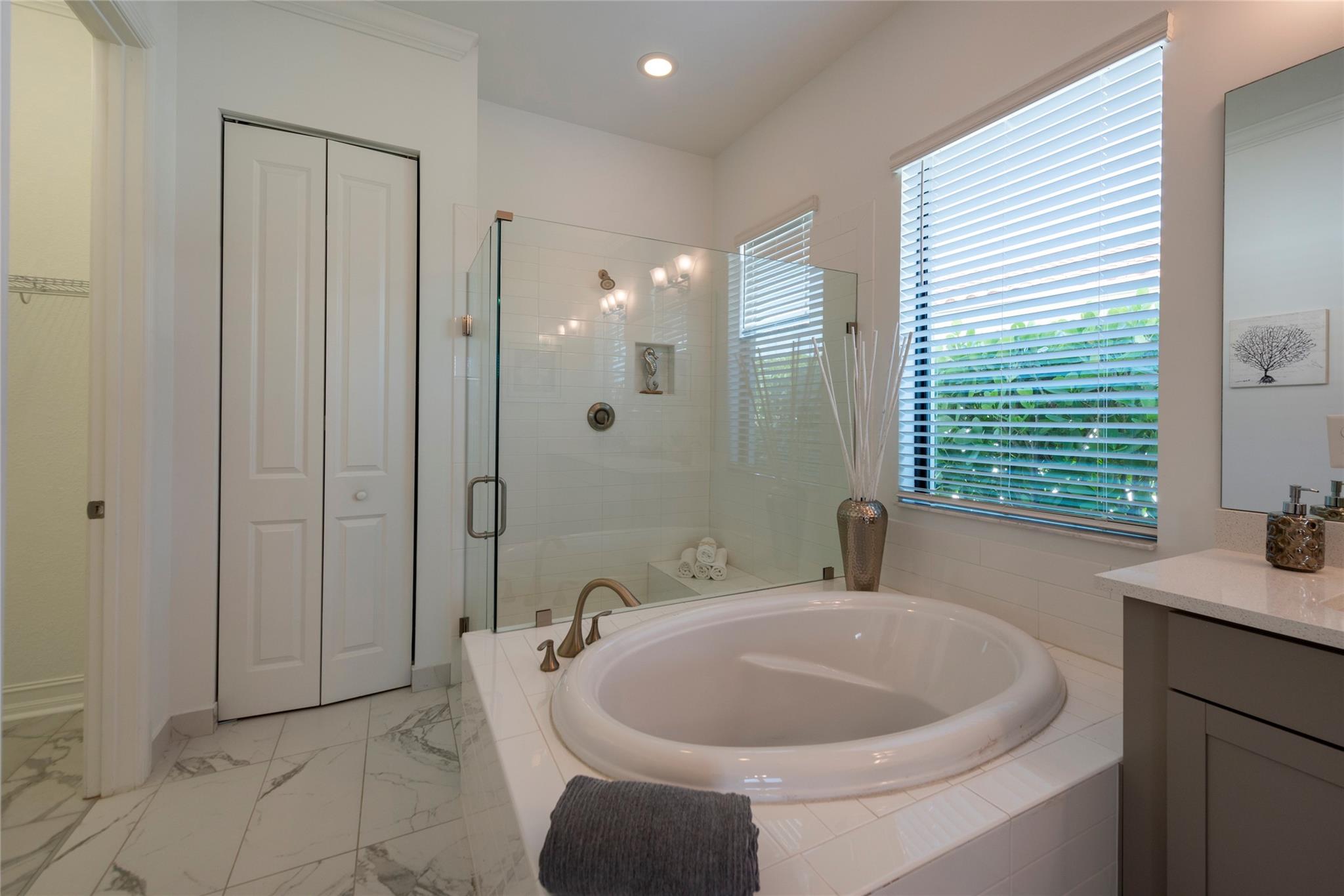 RELAX AND ENJOY THIS MAGNIFICENT BATHROOM, AN OWNER'S RETREAT WITH YOUR SOAKING TUB AND ALL THE BEAUTIFUL PRIVATE SURROUNDINGS!