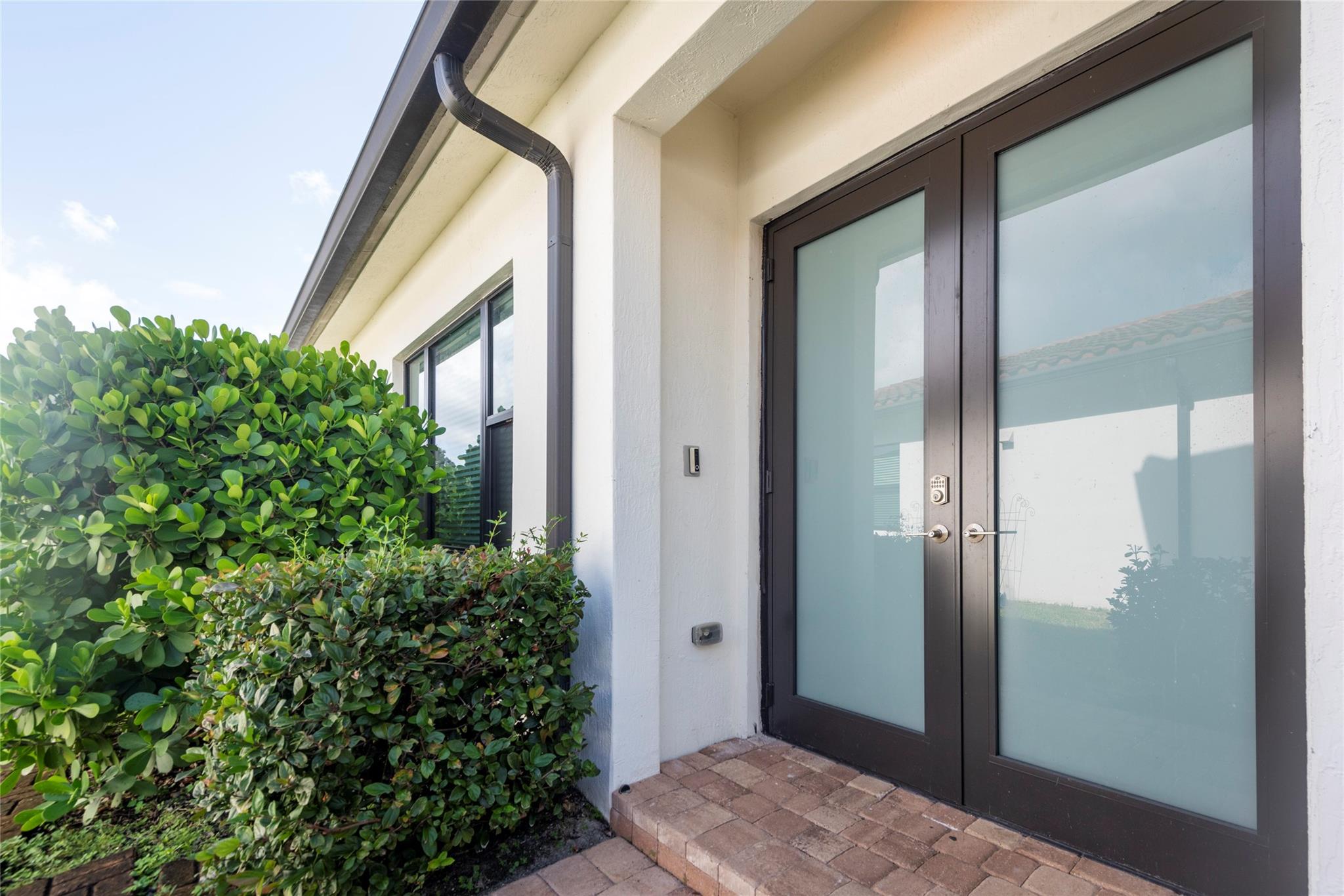 NEWLY INSTALLED BEAUTIFUL MODERN IMPACT FRONT ENTRANCE DOORS