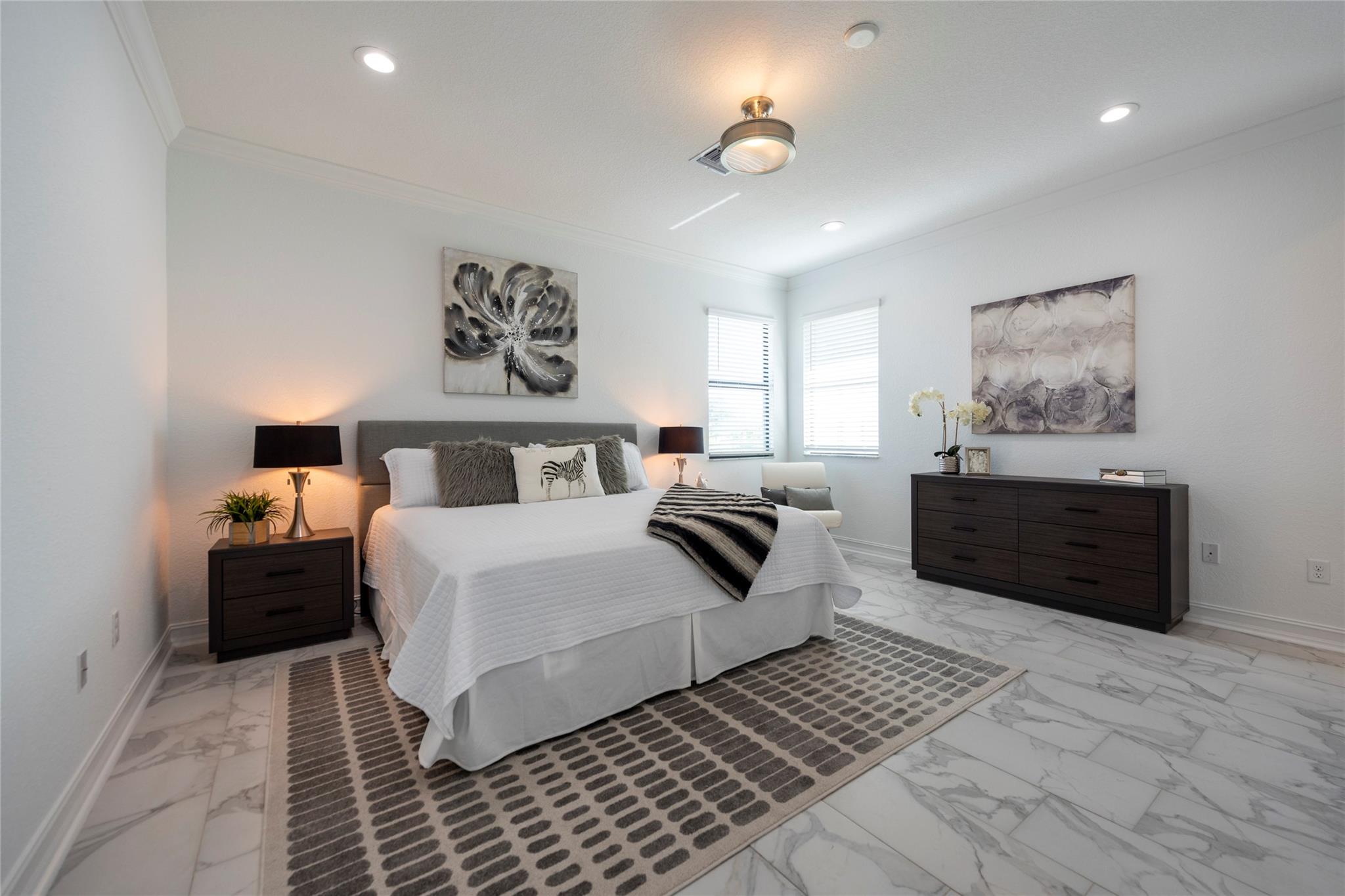 THIS 2ND FLOOR BEDROOM IS HUGE AND COULD BE A SECOND PRIMARY SUITE! FRESHLY PAINTED LIGHT AND BRIGHT WITH A WINDOW VIEW OF THE LAKE BELOW!